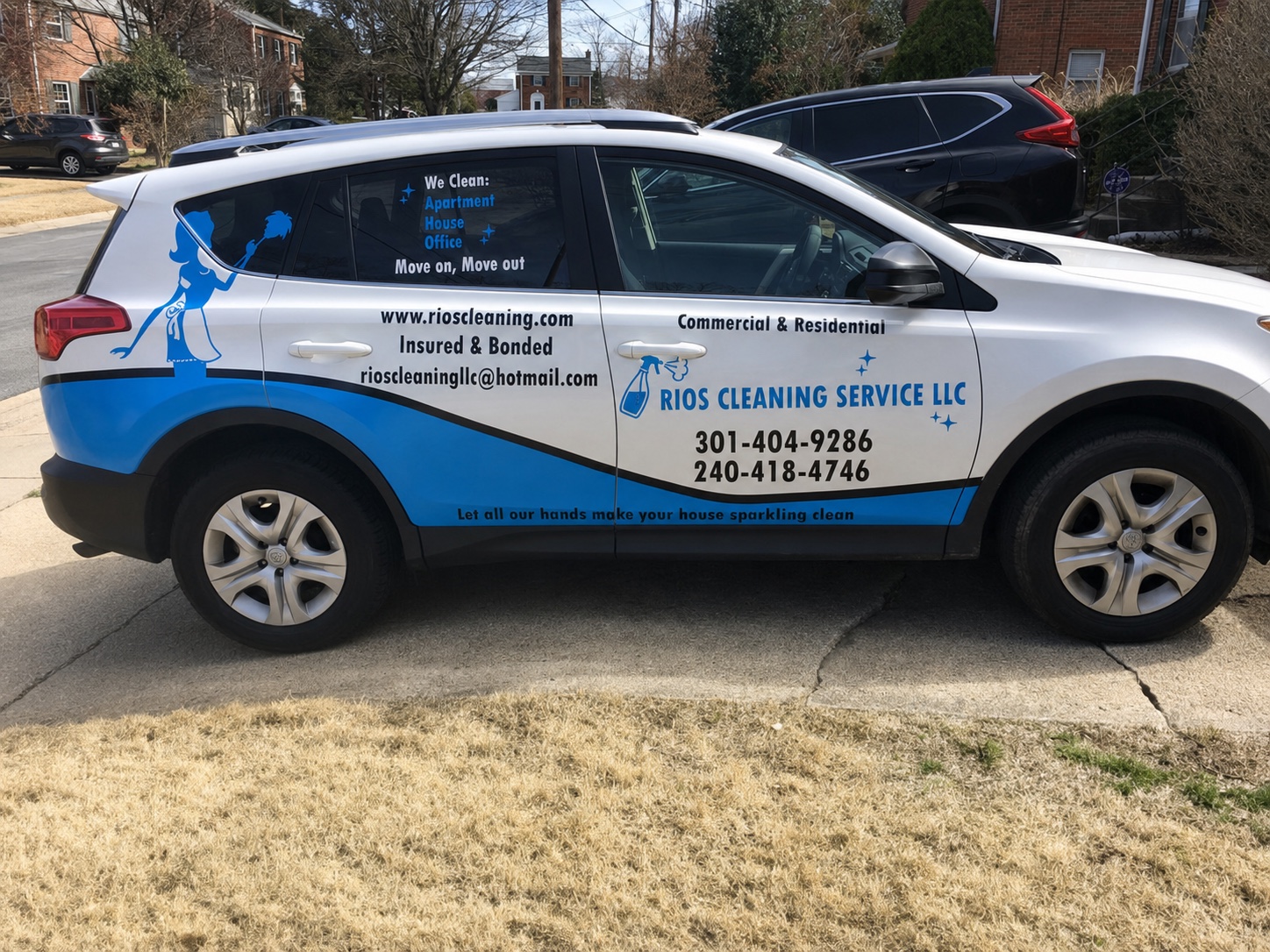 Rios Cleaning Services vehicle parked in a local residential neighborhood
